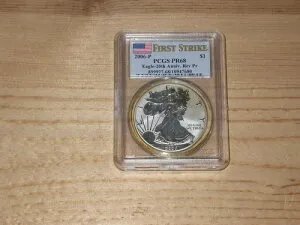 2006-P アメリカン シルバー イーグル ** PCGS PR68 Rev. Pr. ** ファースト ストライク フラッグ スラブ ASE