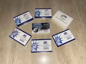 米国造幣局プルーフセット（6枚＋四半期）ロット。2000年、2001年、2003年、2005年、2006年、2007年、2009年四半期を含む