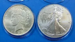 美しいアメリカのコイン2枚 - 1923年シルバーピースドルと2023年シルバーイーグル