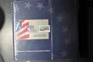 50州クォーター硬貨「Greetings from America」カードと切手アルバム - 1999年から2007年