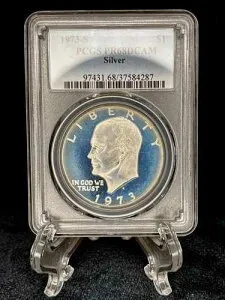 アイゼンハワー・ダラー 1973-S PCGS PR68 DCAM シルバー：トゥルーブルー・ハロー・トーニング (1)