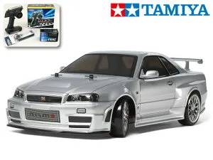 ！【 TAMIYA / タミヤ 】 58605 1/10 電動RC ニスモ R34 GT-R Z-tune （TT-02Dシャーシ） ドリフトスペック ・サンワ：MX-6 コンピュータプロポ付フルセット（未組立） ≪ラジコン≫