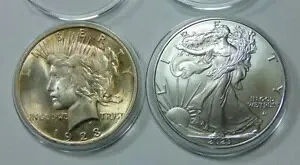 2 つの美しいアメリカのコイン - 1923 シルバー ピース ダラーと 2023 シルバー イーグル